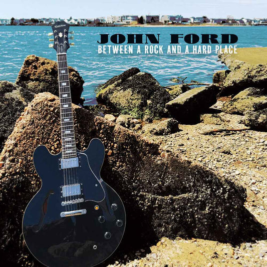 Pre-Order: Between A Rock And A Hard Place [CD]