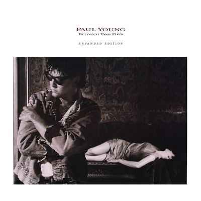 Paul Young - Between Two Fires (180G) [Flame Red Vinyl] [2LP] [Vinyl]